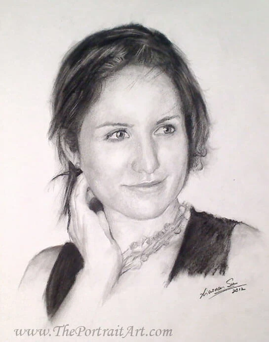 Commissioned hand-drawn charcoal portrait by Victor Sun